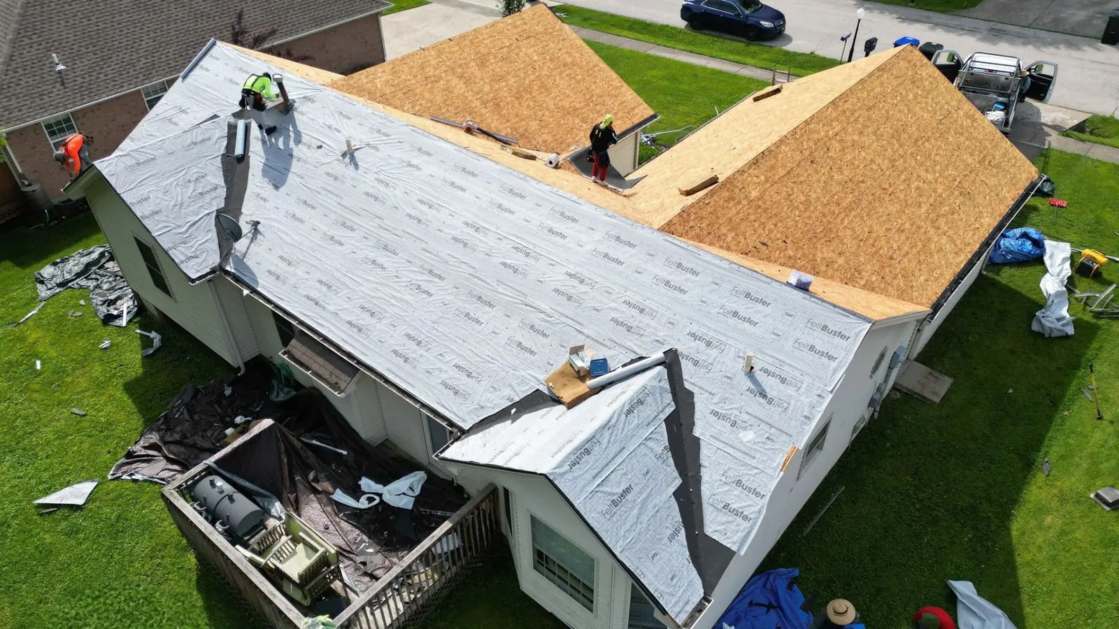 317 Roofing Co. roof replacement in progress showing the layered roofing system